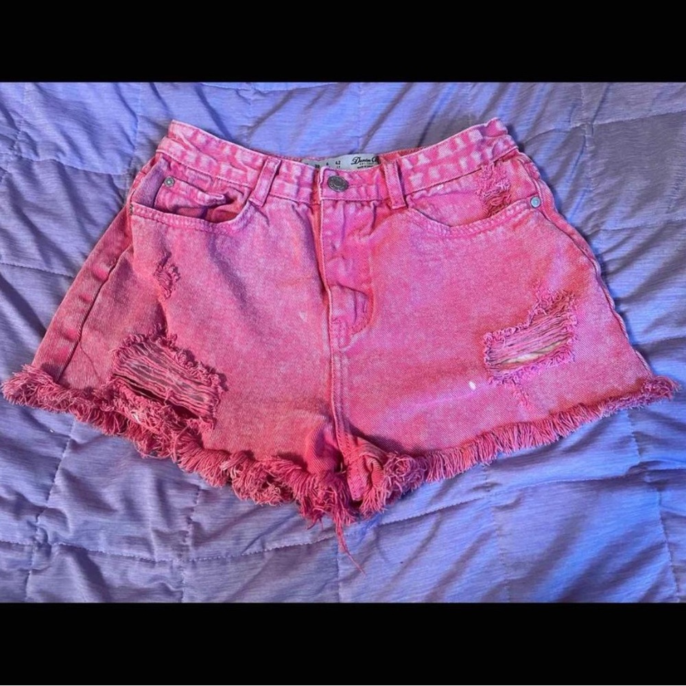 ripped pink denim shorts